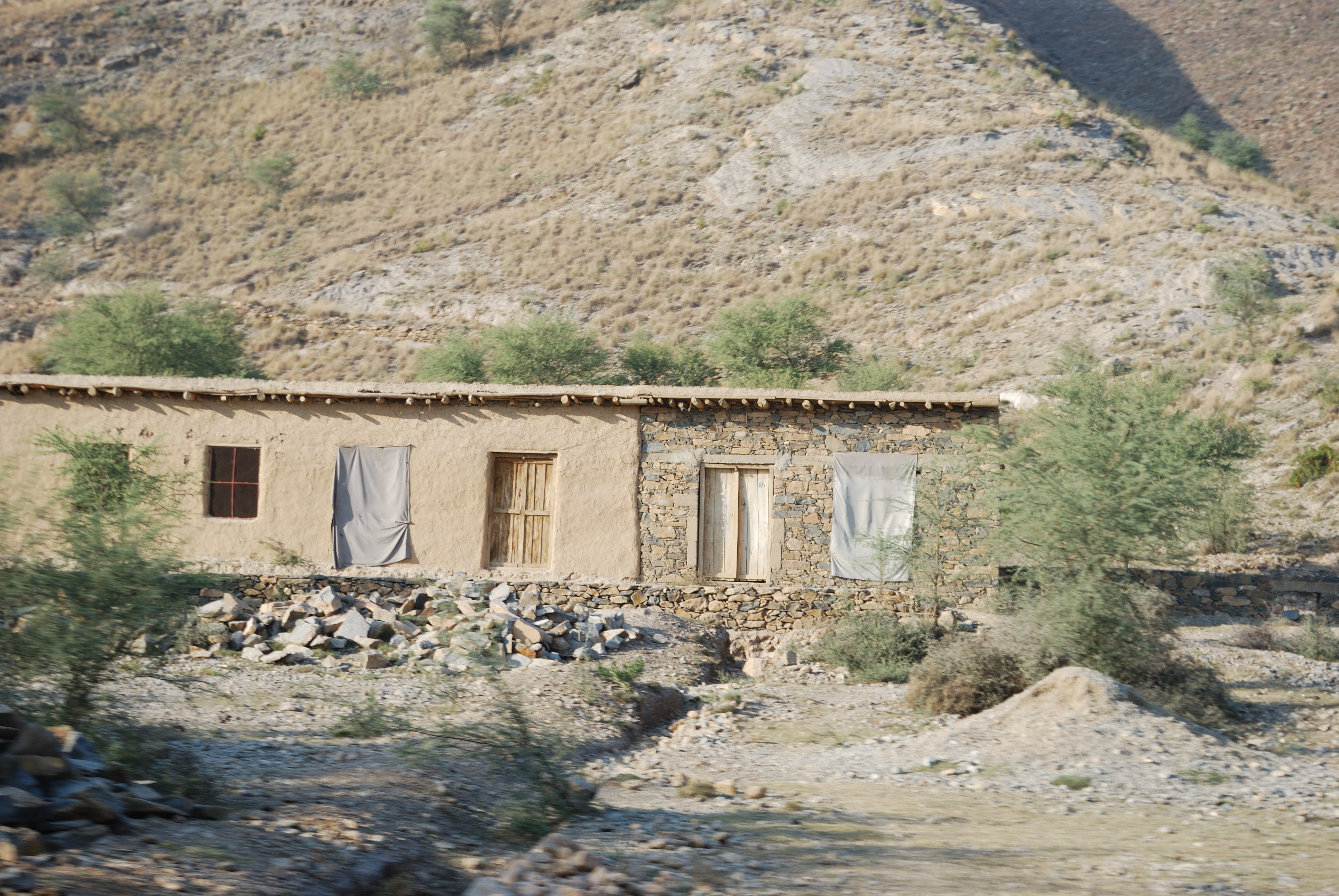 Traditional perimeter stone walls ensuring domestic privacy